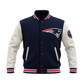 Navy and white varsity jacket with a NFL team logo on a white background