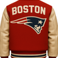 Red varsity jacket with 'Boston' and a logo on the back, on a neutral background