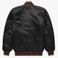 Back of Baltimore Orioles satin varsity jacket featuring large team logo and striped ribbed hem