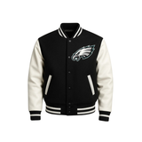 Black and white varsity jacket with a philadelphia eagles logo on a left chest