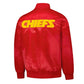 Back of Kanas City Chiefs satin varsity jacket featuring large team logo and striped ribbed hem
