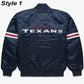 Back of Houston Texans satin varsity jacket featuring large team logo and striped ribbed hem
