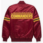 Back of Washington Commanders satin varsity jacket featuring large team logo and striped ribbed hem

