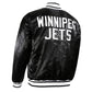 Back of NHL Winnipeg Jets satin varsity jacket in black colour featuring large team logo and striped ribbed hem
